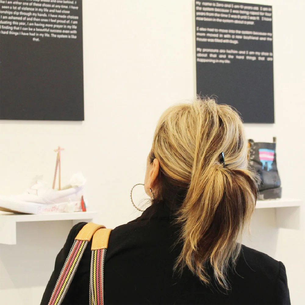 gallery visitor viewing walk-a-mile exhibit