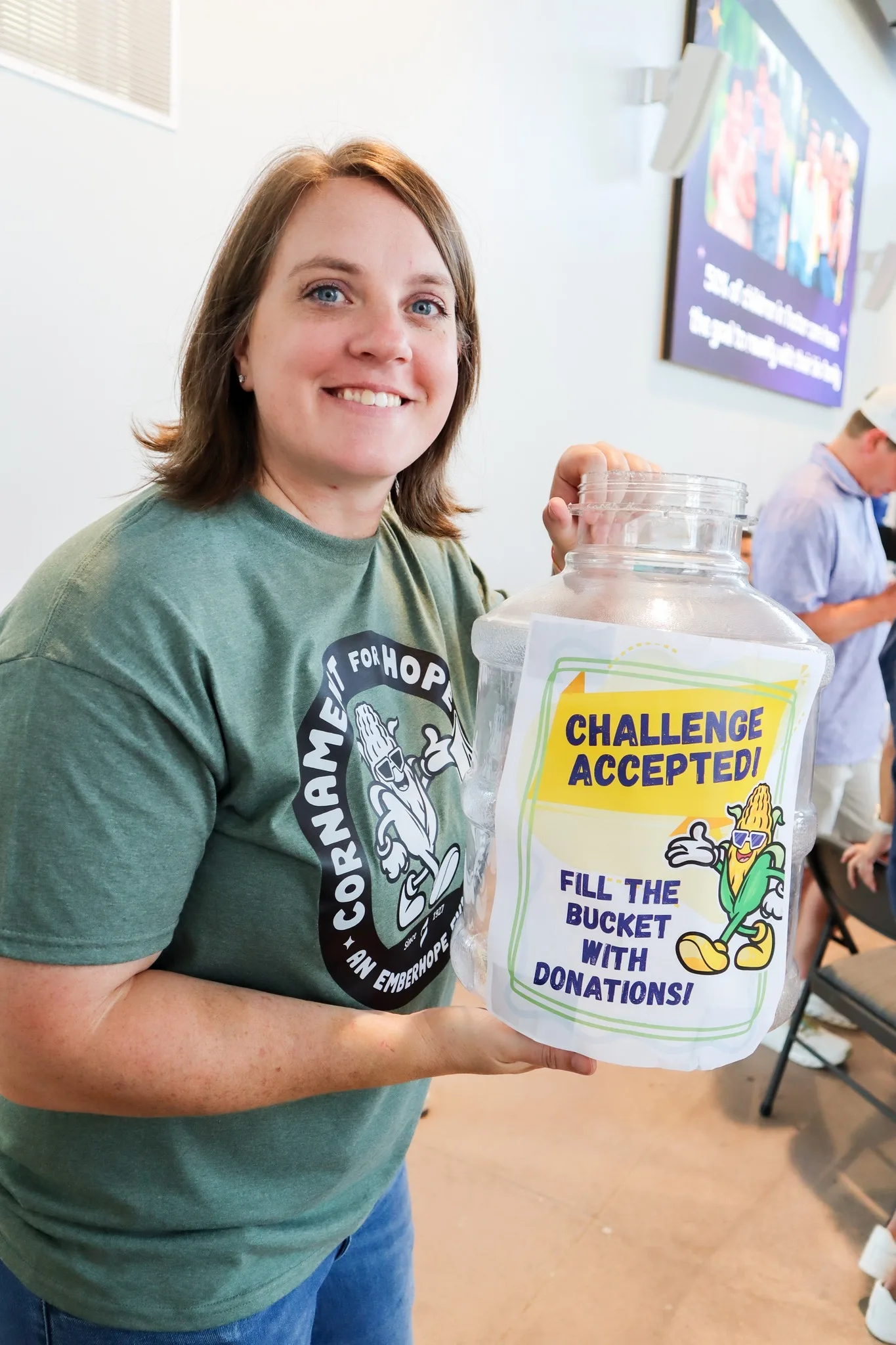 Charissa Wall, Associate Director of Development, fundraises at the Cornament for Hope