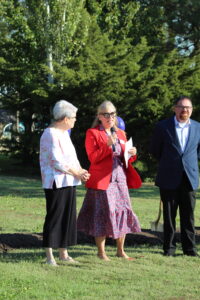 Nickaila Sandate, EmberHope CEO, share a message at the Groundbreaking