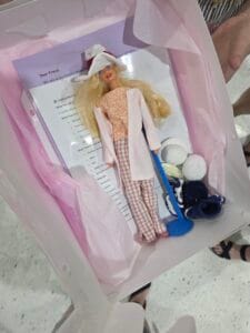 A custom made Barbie doll in a package