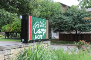 Camp Hope sign on an electronic sign at a church