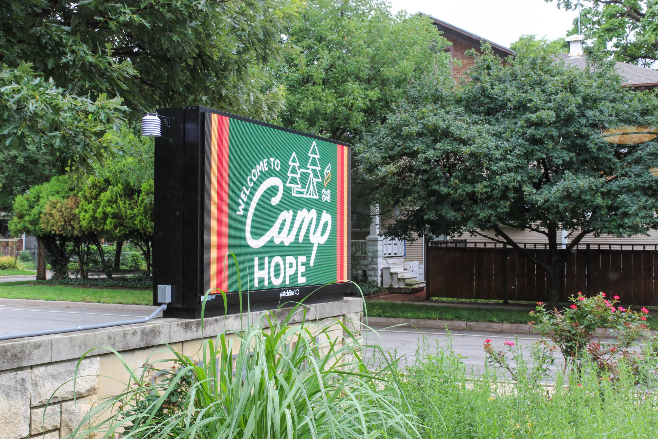 Camp Hope sign on an electronic sign at a church