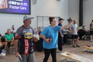 Teams participating in Cornhole at the Sandbox