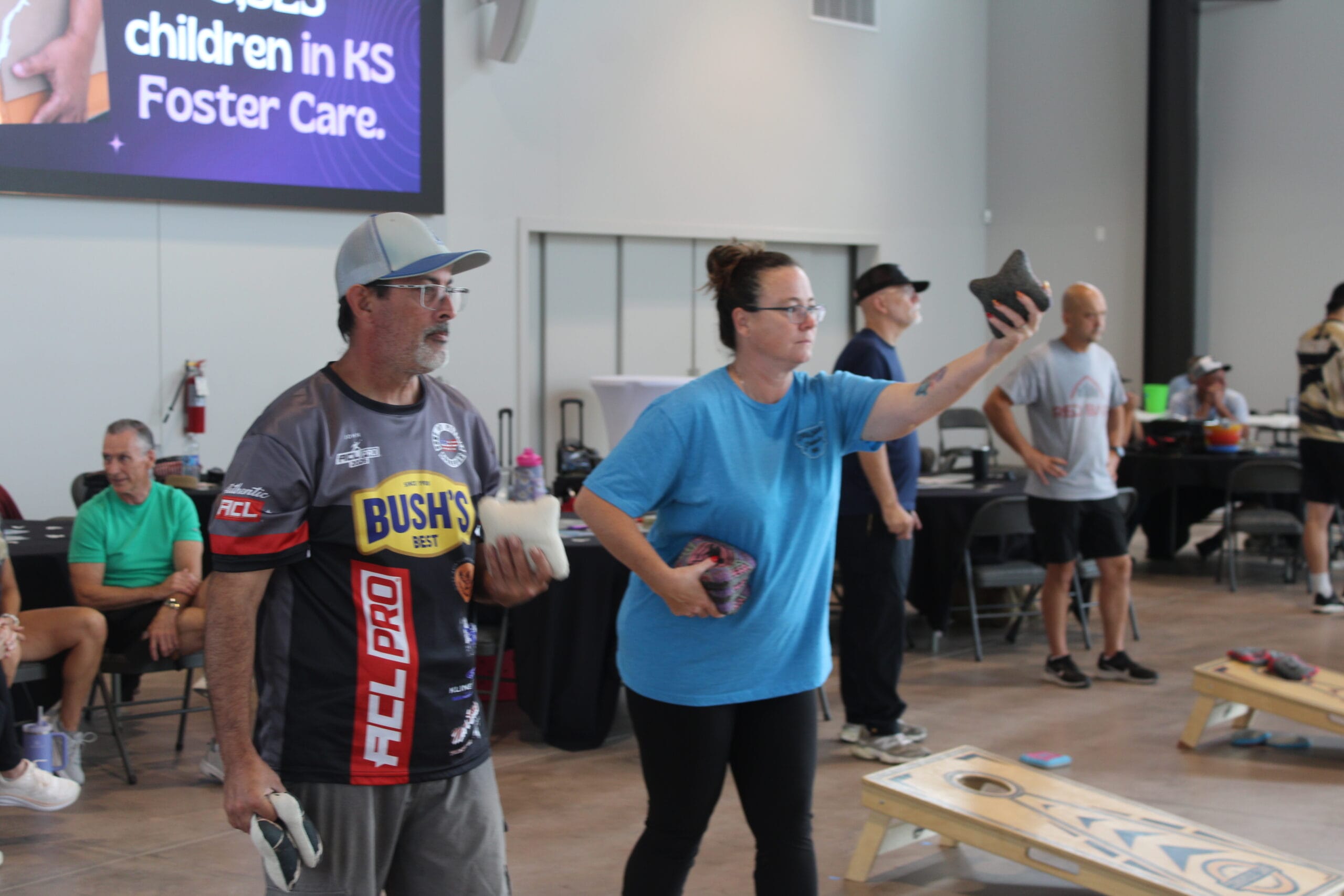Teams participating in Cornhole at the Sandbox